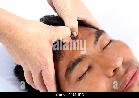 chakras third eye massage ancient Maya therapy central America shiatsu Stock Photo