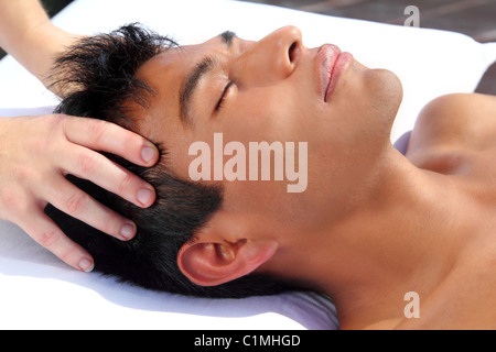 chakras head massage ancient Maya therapy central America shiatsu Stock Photo