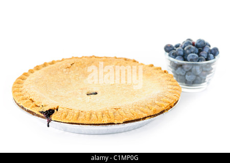 Whole blueberry pie with fresh wild blueberries isolated on white background Stock Photo