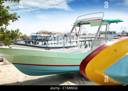 boats colorful in Isla Mujeres beach Mexico Mayan Riviera Cancun Stock Photo