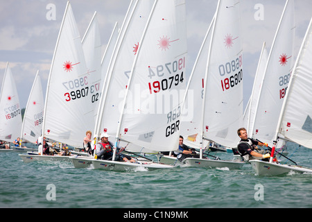 Laser dinghy racing in Chichester Harbour, Hampshire UK Stock Photo
