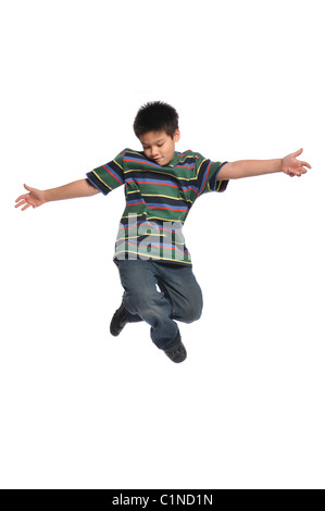 Child tap dancer jumping isolated on white background Stock Photo