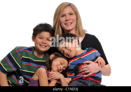 Mother and children's portrait having fun isolated on a white background Stock Photo