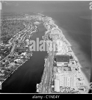 America, 1950s. Aerial view of the coast and city of Miami, Florida ...