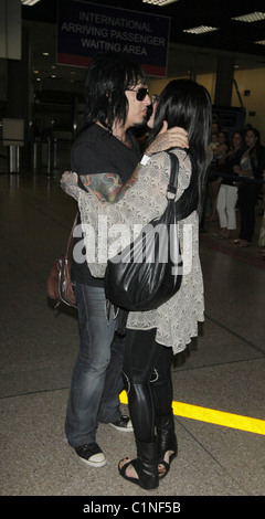 Nikki Sixx arrives at LAX airport and is met by his girlfriend Kat