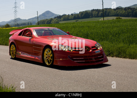 Ruby-Covered Red Gold Mercedes SLR This very special Mercedes SLR McLaren from Ueli Anliker Design has been adorned with 500 Stock Photo