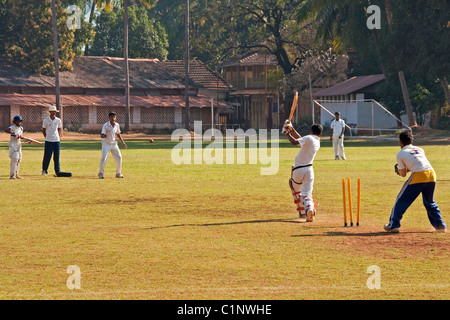 Schoolboys playing cricket in Panaji, Goa. Stock Photo