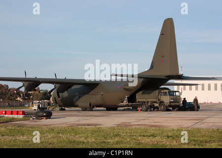 Royal Air Force Hercules C4 (C-130J) military transport plane unloading cargo in Malta. Logistics and supply chain. Stock Photo
