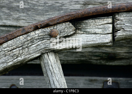 Close up of an old wagon wheel in the Drumheller area of Alberta, Canada. Stock Photo