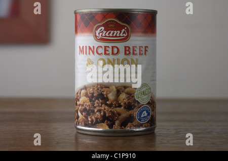 Tinned food on an oak wood table Stock Photo