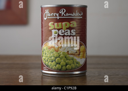 Tinned food on an oak wood table Stock Photo