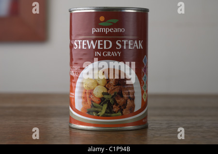 Tinned food on an oak wood table Stock Photo