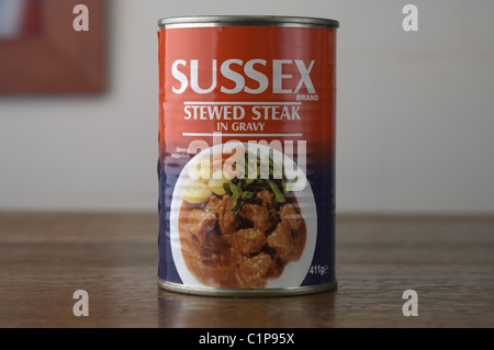 Tinned food on an oak wood table Stock Photo