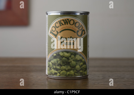 Tinned food on an oak wood table Stock Photo