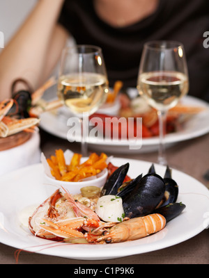 Prepared lobster, crayfish and mussel in plate Stock Photo