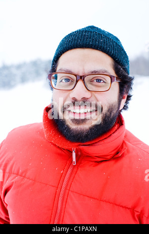 Portrait of mid adult man in winter clothing Stock Photo