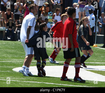 David Beckham joins former Real Madrid teammate Zinedine Zidane to celebrate the opening of the start of the American league's Stock Photo