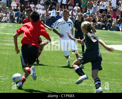 David Beckham joins former Real Madrid teammate Zinedine Zidane to celebrate the opening of the start of the American league's Stock Photo