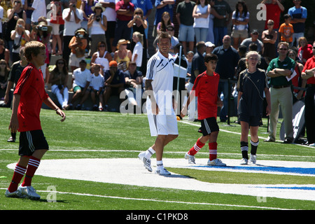 David Beckham joins former Real Madrid teammate Zinedine Zidane to celebrate the opening of the start of the American league's Stock Photo