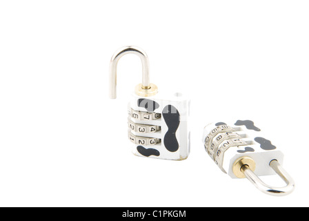 cow pattern combination padlock (closed and open) isolated on white background Stock Photo