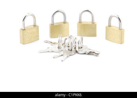 Golden open padlock with keys on white Stock Photo