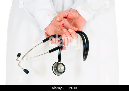 Medical doctor with a stethoscope and hands behind his back Stock Photo -  Alamy