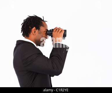 Businessman with binoculars Stock Photo