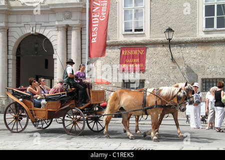 Fiaker at the Residenz Platz in Salzburg Austria Stock Photo