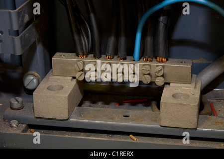 Neutral bar in a consumer unit, showing mixed colours Stock Photo