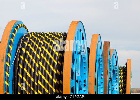 Undersea electric cabling on the dockside in Barrow in Furness, Cumbria, destined for the Walney offshore wind farm. Stock Photo