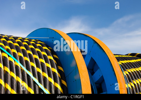 Undersea electric cabling on the dockside in Barrow in Furness, Cumbria, destined for the Walney offshore wind farm. Stock Photo