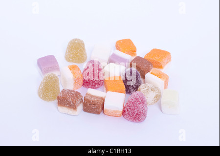 A selection of dolly mixtures traditional sweets on a white background Stock Photo