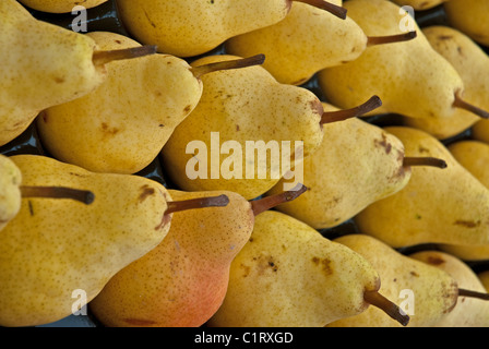 Close-up of a try of pears for sale in a market Stock Photo