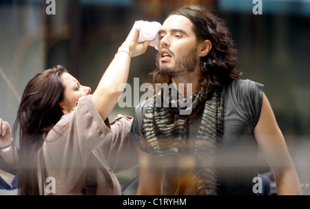 Russell Brand as character Aldous Snow, filming the movie, 'Get Him to The Greek' at Rockefeller Plaza New York City, USA - Stock Photo