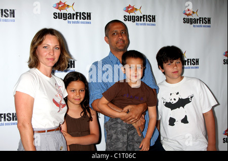 Kelli Williams and her husband Ajay Sahgal with their children Kiran