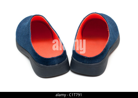 Pair baby footwear with orange insole on white background Stock Photo