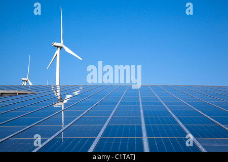 Solar and wind energy with clear sky Stock Photo