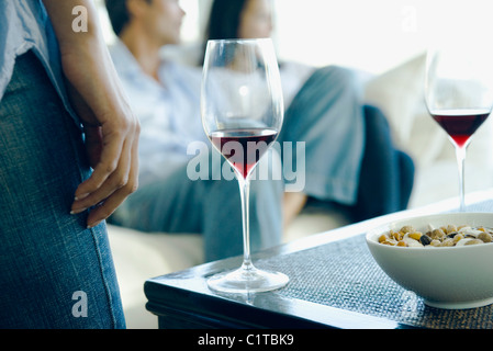 Red wine being served at party Stock Photo