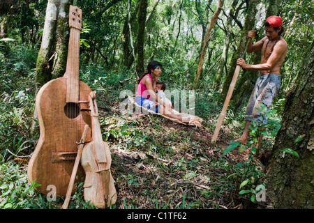 Mbya Guarani residents of aldea Katupyry near San Ignacio, Misiones, Argentina, with instruments hand-made in the community. Stock Photo