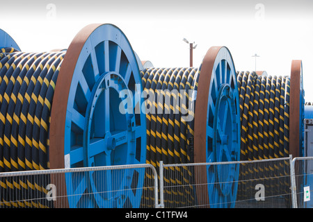 Undersea electric cabling on the dockside in Barrow in Furness, Cumbria for the Walney offshore wind farm. Stock Photo