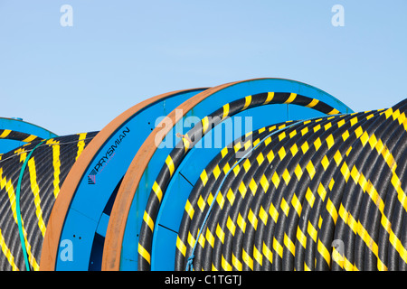 Undersea electric cabling on the dockside in Barrow in Furness, Cumbria for the Walney offshore wind farm. Stock Photo