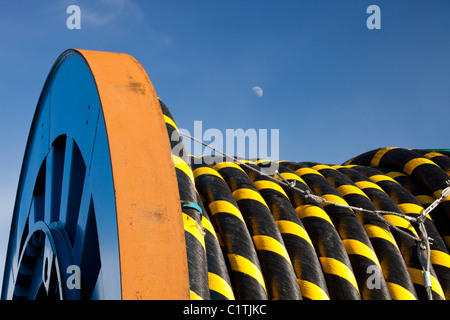 Undersea electric cabling on the dockside in Barrow in Furness, Cumbria for the Walney offshore wind farm. Stock Photo