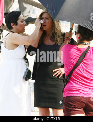 Jennifer Aniston has make up applied on the set of her new film 'Bounty Hunter' shooting in front of NYC's Supreme Courthouse Stock Photo