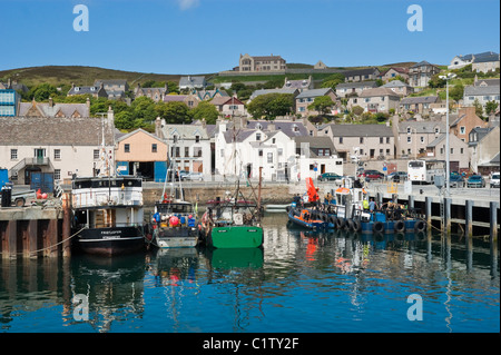 Fishing boats moored in Stromness Harbour on the Orkney Mainland in Scotland