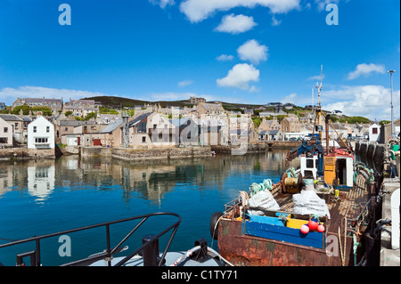 Fishing boats moored in Stromness Harbour on the Orkney Mainland in Scotland Stock Photo