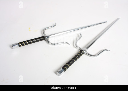 A pair of Egyptian style sai daggers; blunt for martial arts training and competitions. Stock Photo