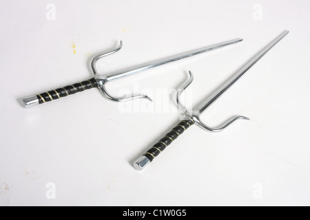 A pair of Egyptian style sai daggers; blunt for martial arts training and competitions. Stock Photo