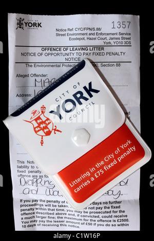 Fixed Penalty Notice and Minibin handed out by York City Council Street Environment Service for dropping a cigarette end. Stock Photo