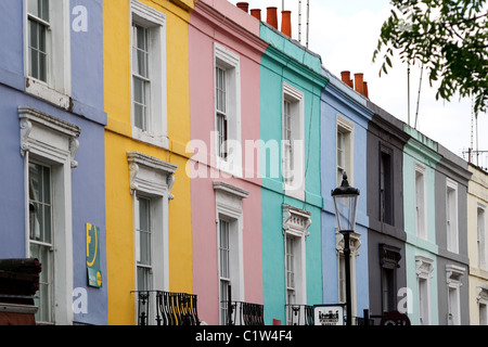 A row of colourful terraced houses on Portobello Road in West London, England. Stock Photo