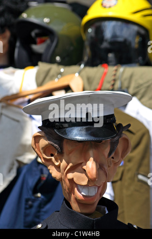 A mask caricaturing British Royal, Charles, Prince of Wales on Portobello Road in London, England. Stock Photo